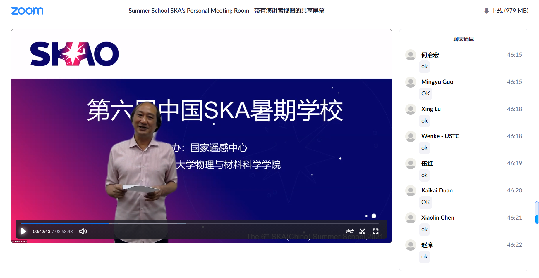A person standing in front of a screenDescription automatically generated with medium confidence